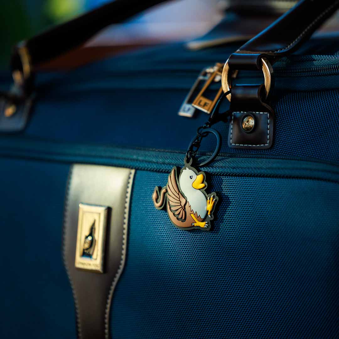 Duck Duck Surprise Magical Ducks Rubber Duck Keychain Gregory Griffin on London Fog Duffle Bag